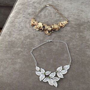 Gold Floral Statement and Silver Leaf costume necklaces.